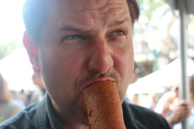 Greg from OC Beer Blog showing off his Corndog eatin skills. 